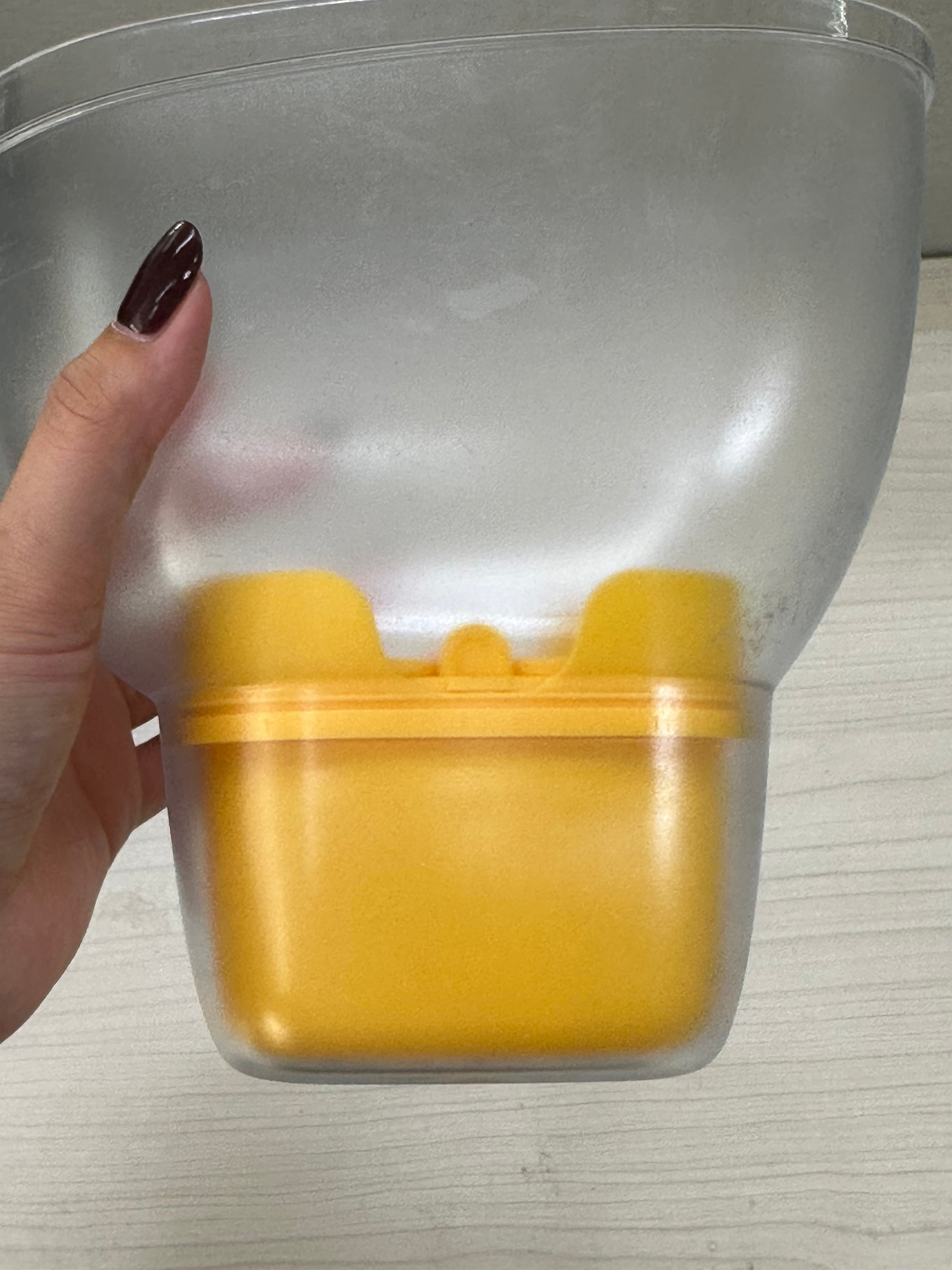 filter in the jug hand